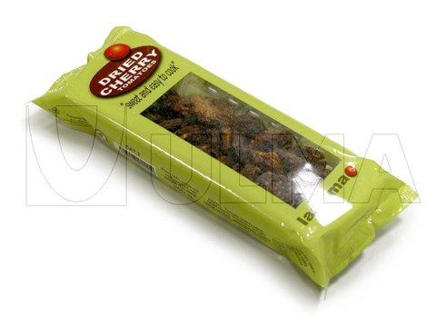 Flowpack makinede tabakta kurutulmuş çeri (cherry) domates paketleme
