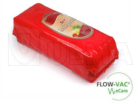 Flow VAC makinesinde paketlenmiş peynir bloğu