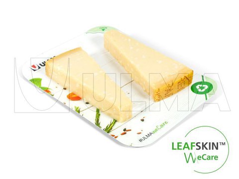 Hazır tabak kapama makinesinde sürdürülebilir bir çözüm olan LeafSkin(TM) ile Parmigiano-Reggiano peyniri paketleme