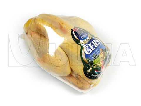 Flowpack makinede bariyerli shrink filmle (BDF®) bütün tavuk paketleme